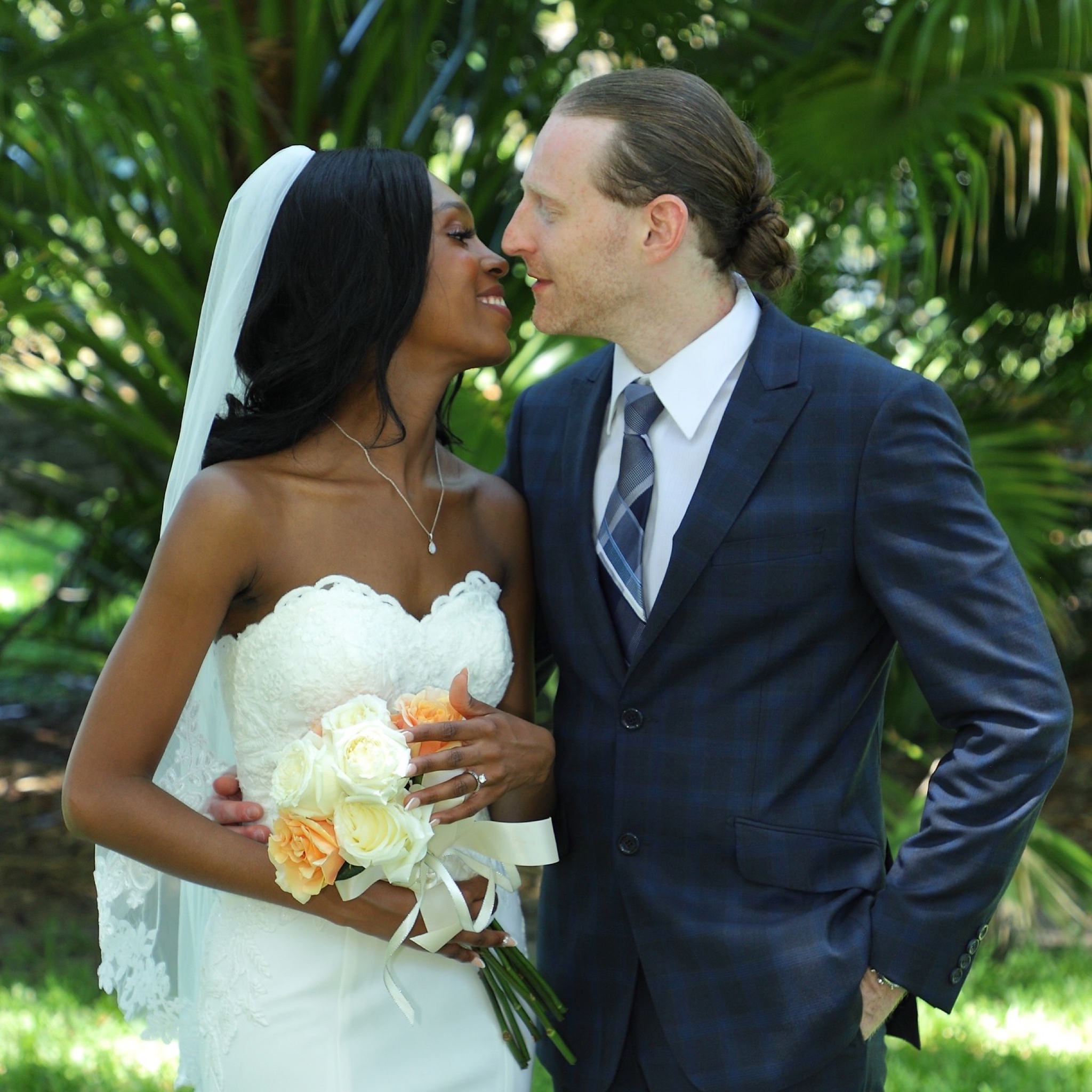 Groom and bride about to kiss — a quiet, tender moment