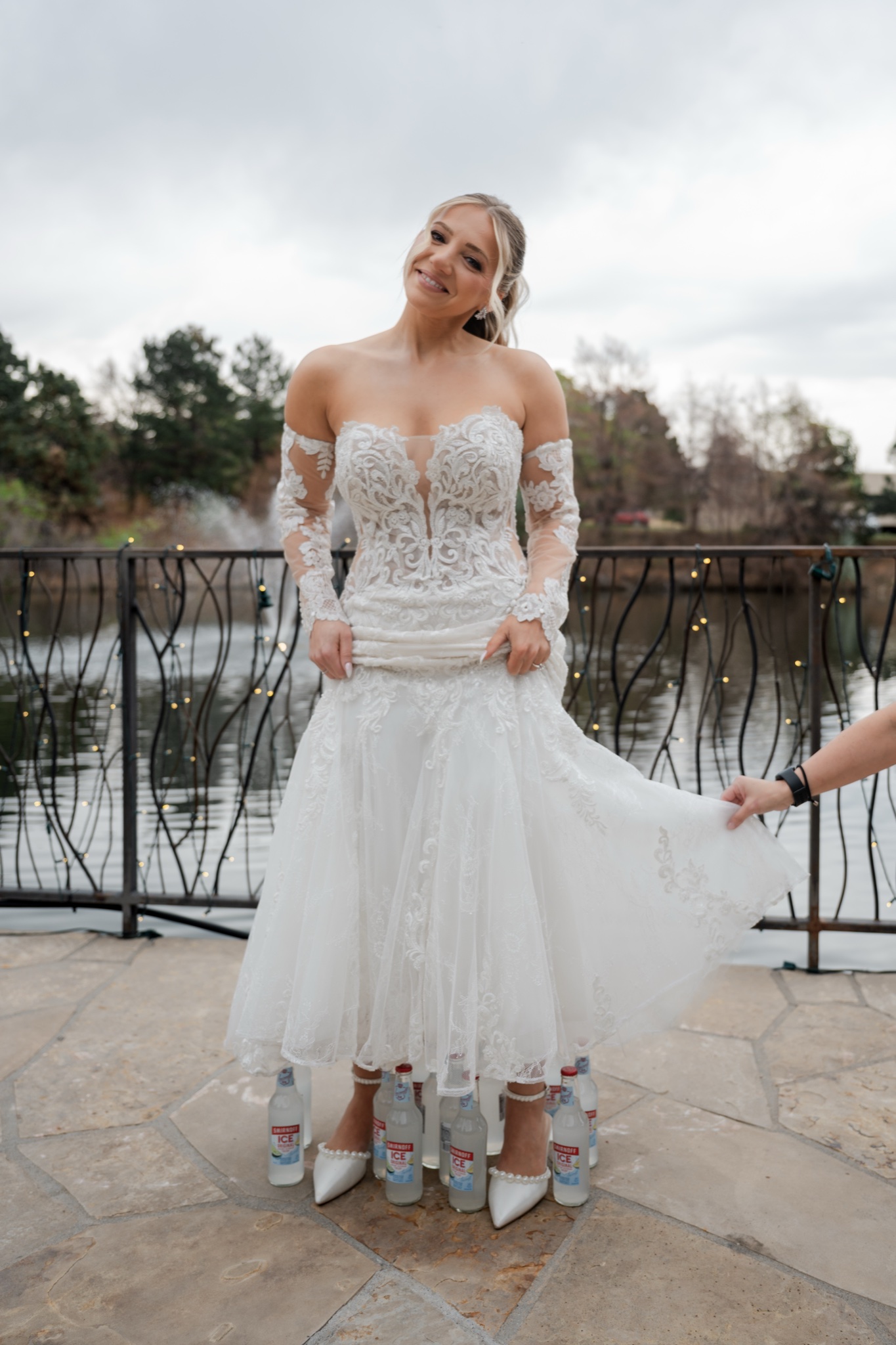 Bride dramatically revealing Smirnoff Ices from under her dress